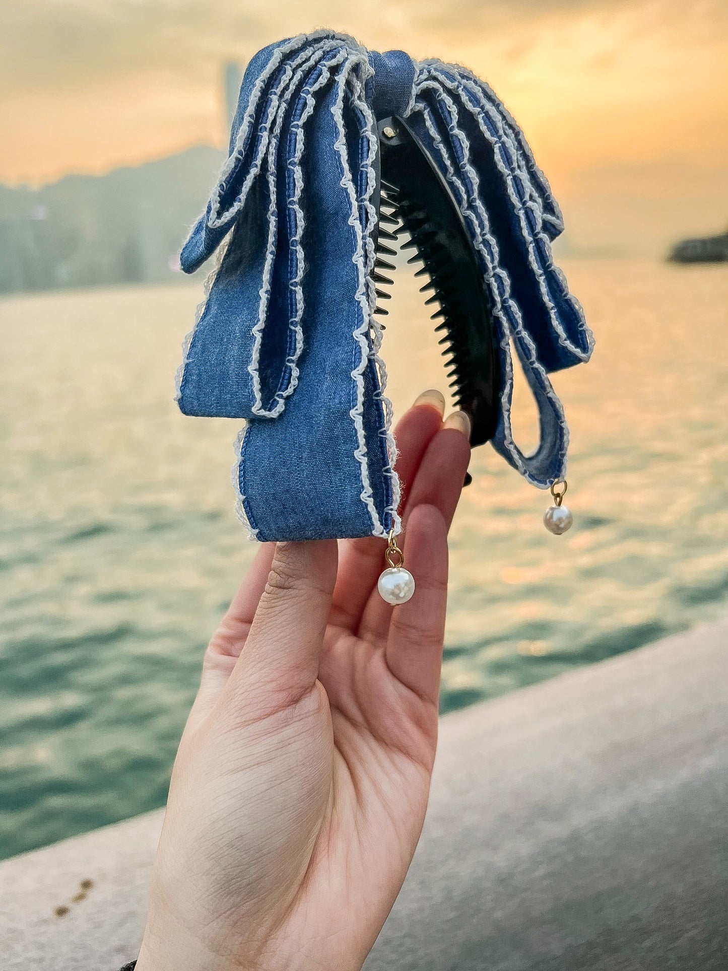👖韓國牛仔布蝴蝶結香蕉夾